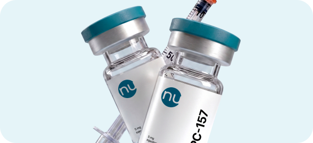BPC-157 injection vials and syringe