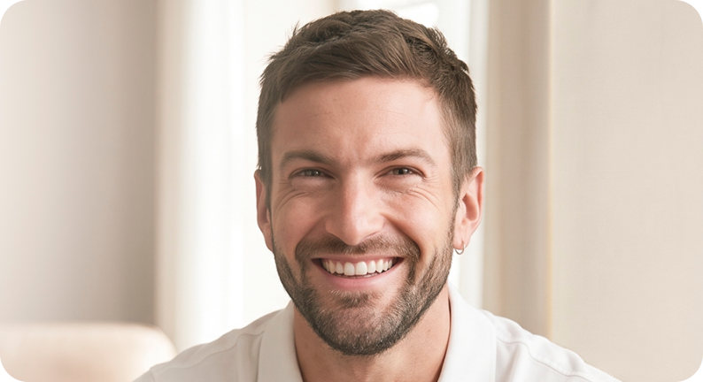 Smiling man in WAYT-less support banner