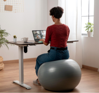 <p>Benefits of Sitting on a Stability or Yoga Ball at Work</p>